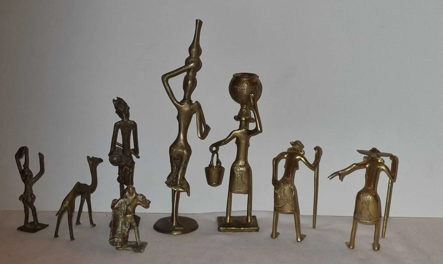 Set 8 brass figurines Western Afrika, lost-wax